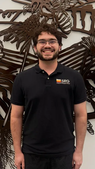 Portrait of Jake Seals wearing an SRG polo shirt.